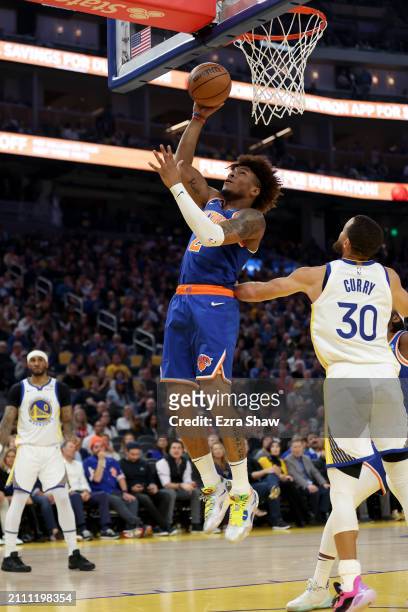 Miles McBride of the New York Knicks shoots the ball against the Golden State Warriors at Chase Center on March 18, 2024 in San Francisco,...