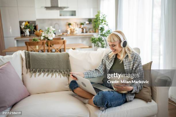 watching movie online - streaming service stock pictures, royalty-free photos & images