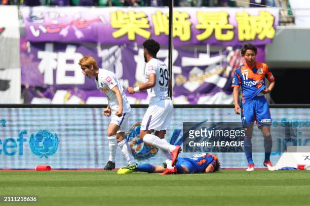 Sho Sasaki of Sanfrecce Hiroshima celebrates with teammate Patric after scoring the team's second goal during the J.League J1 match between V-Varen...