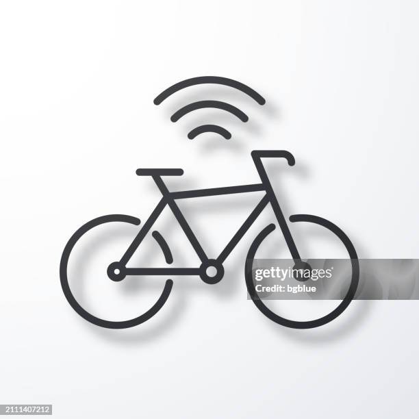 connected bike. line icon with shadow on white background - wireless ev charging stock illustrations