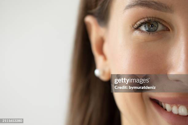 happy eyes of a woman - zoom effect stock pictures, royalty-free photos & images