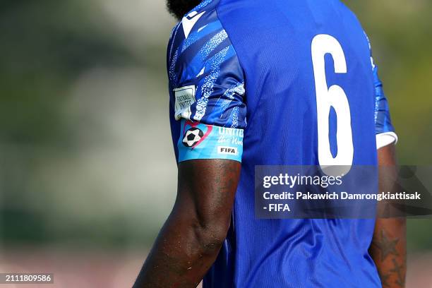 Football unites the world captain's armband is seen during the FIFA Series 2024 Sri Lanka match between Central African Republic and Papua New Guinea...