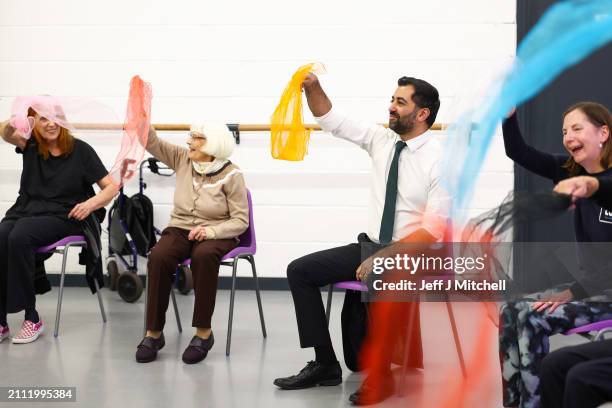 First Minister Humza Yousaf takes part in a dance performance during a visit to DN Studios on March 25, 2024 in Edinburgh, Scotland. The First...