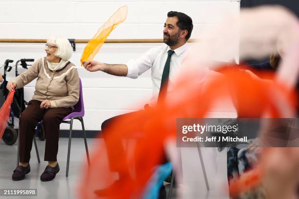 First Minister Humza Yousaf takes part in a dance performance during a visit to DN Studios on March 25, 2024 in Edinburgh, Scotland. The First...