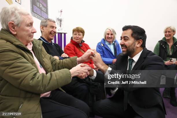 First Minister Humza Yousaf meets staff volunteers and participants during a visit to DN Studios on March 25, 2024 in Edinburgh, Scotland. The First...