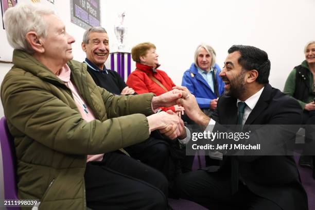 First Minister Humza Yousaf meets staff volunteers and participants during a visit to DN Studios on March 25, 2024 in Edinburgh, Scotland. The First...