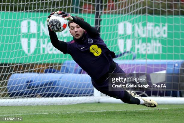 James Trafford of England dives for the ball during a training session at Tottenham Hotspur Training Centre on March 25, 2024 in Enfield, England.