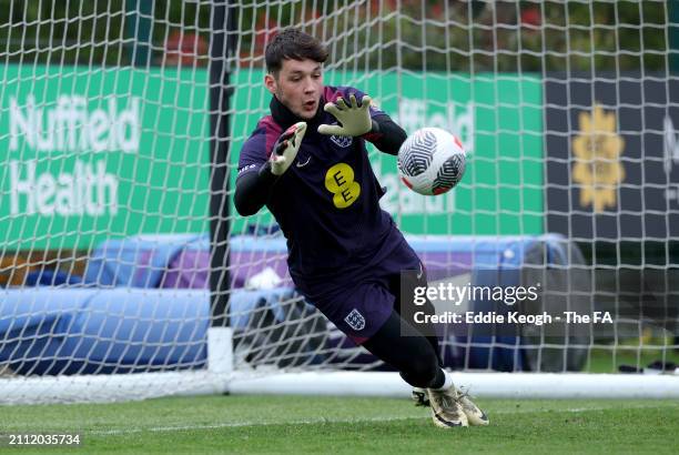 James Trafford of England makes a save during a training session at Tottenham Hotspur Training Centre on March 25, 2024 in Enfield, England.