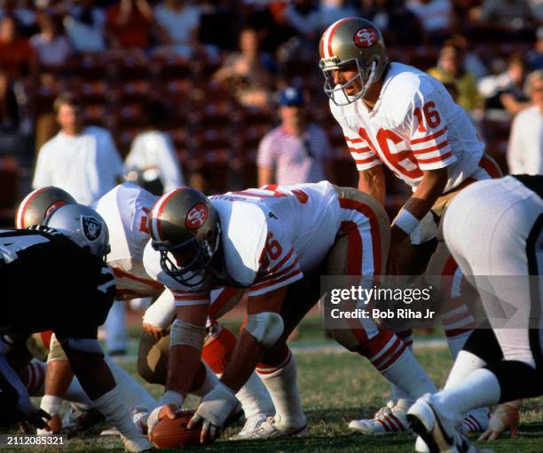 San Francisco Quarterback Joe Montana calls a play during game action of Los Angeles Raiders vs San Francisco 49'ers, August 6, 1983 in Los Angeles,...