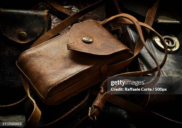 high angle view of leather bag on table - raffaele corte stock pictures, royalty-free photos & images