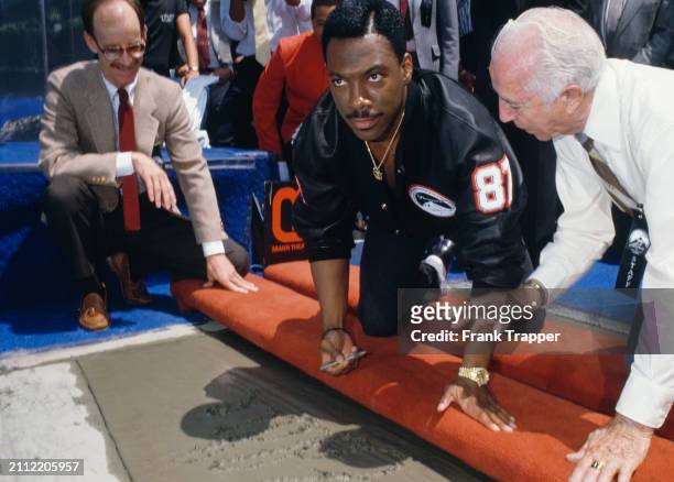 Eddie Murphy at his Hand and Footprint Ceremony at Grauman's Chinese Theatre in Hollywood, California. May 14, 1987. Photo by Frank Trapper/Corbis...