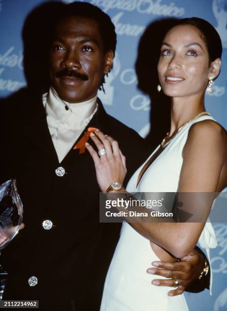 Eddie Murphy and Nicole Mitchell Murphy during the Annual People's Choice Awards at Santa Monica, California, United States, January 12, 1997.