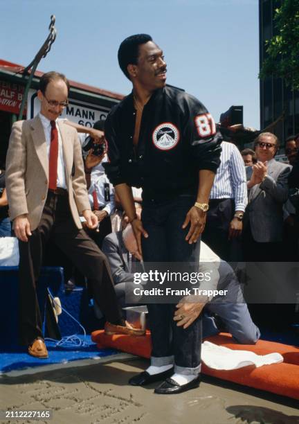 Eddie Murphy at his Hand and Footprint Ceremony at Grauman's Chinese Theatre in Hollywood, California. May 14, 1987. Photo by Frank Trapper/Corbis...