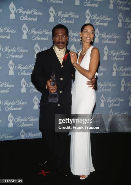 Eddie Murphy and Nicole Mitchell Murphy during The 23rd Annual People's Choice Awards at Santa Monica Airport in Santa Monica, California, United...