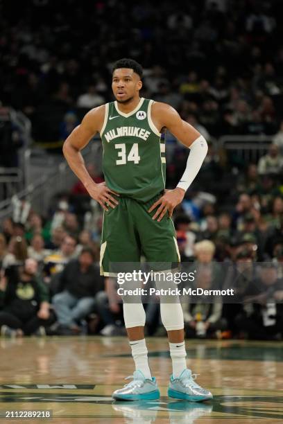 Giannis Antetokounmpo of the Milwaukee Bucks looks on during the second half against the Oklahoma City Thunder at Fiserv Forum on March 24, 2024 in...