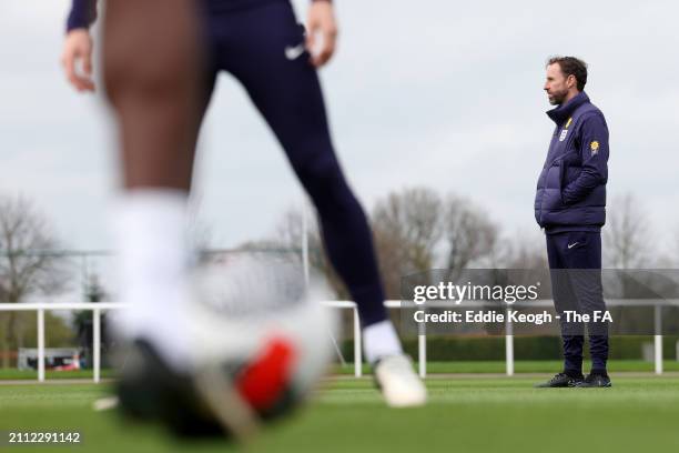 Gareth Southgate, Manager of England men's senior team, looks on during a training session at Tottenham Hotspur Training Centre on March 25, 2024 in...