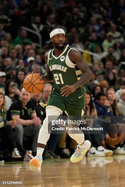 Patrick Beverley of the Milwaukee Bucks dribbles the ball during the second half against the Oklahoma City Thunder at Fiserv Forum on March 24, 2024...