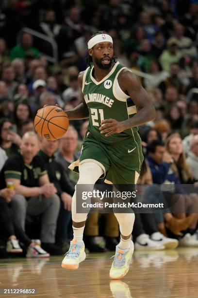 Patrick Beverley of the Milwaukee Bucks dribbles the ball during the second half against the Oklahoma City Thunder at Fiserv Forum on March 24, 2024...