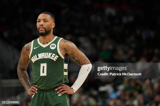 Damian Lillard of the Milwaukee Bucks looks on during the second half against the Oklahoma City Thunder at Fiserv Forum on March 24, 2024 in...