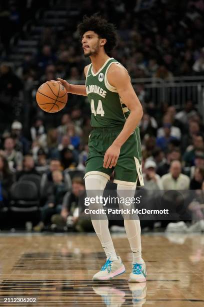 Andre Jackson Jr. #44 of the Milwaukee Bucks dribbles the ball during the second half against the Oklahoma City Thunder at Fiserv Forum on March 24,...