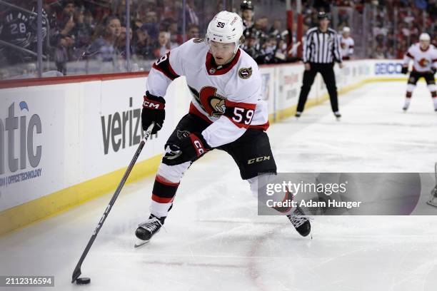 Angus Crookshank of the Ottawa Senators in action against the New Jersey Devils during the first period at the Prudential Center on March 23, 2024 in...