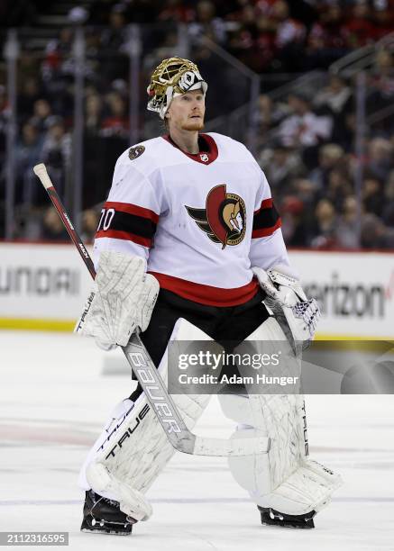 Joonas Korpisalo of the Ottawa Senators during a break in action against the New Jersey Devils during the second period at the Prudential Center on...