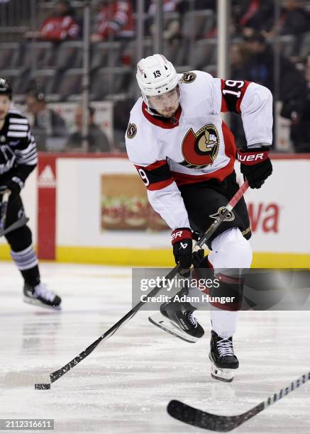 Drake Batherson of the Ottawa Senators in action against the New Jersey Devils during the third period at the Prudential Center on March 23, 2024 in...