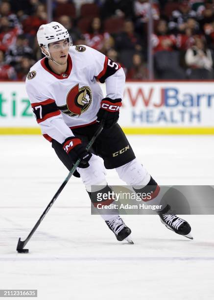 Shane Pinto of the Ottawa Senators in action against the New Jersey Devils during the first period at the Prudential Center on March 23, 2024 in...