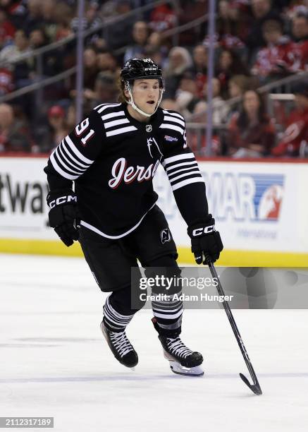 Dawson Mercer of the New Jersey Devils in action against the Ottawa Senators during the second period at the Prudential Center on March 23, 2024 in...