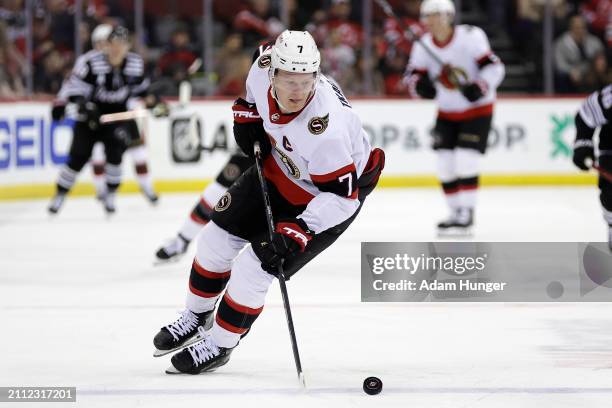 Brady Tkachuk of the Ottawa Senators in action against the New Jersey Devils during the third period at the Prudential Center on March 23, 2024 in...