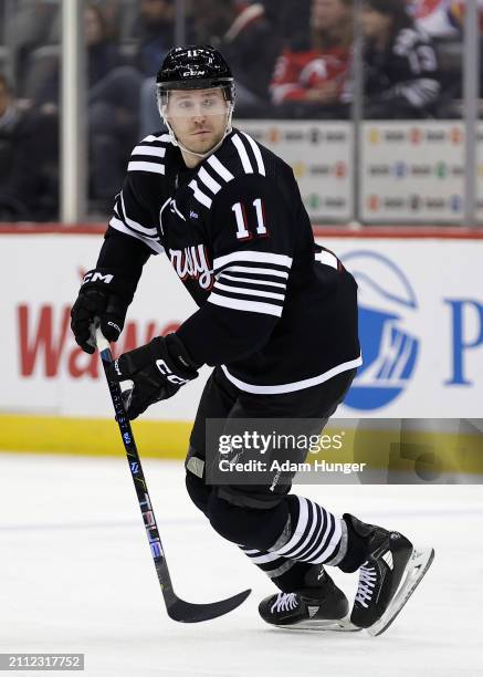 Chris Tierney of the New Jersey Devils in action against the Ottawa Senators during the second period at the Prudential Center on March 23, 2024 in...