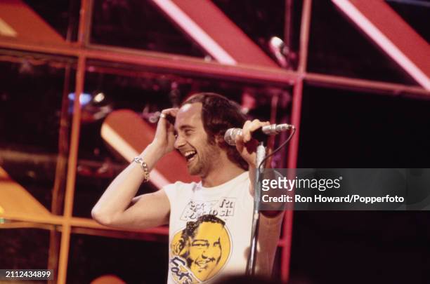 Singer Roger Chapman of English rock group Family performs on the set of a pop music television show in London circa 1971.