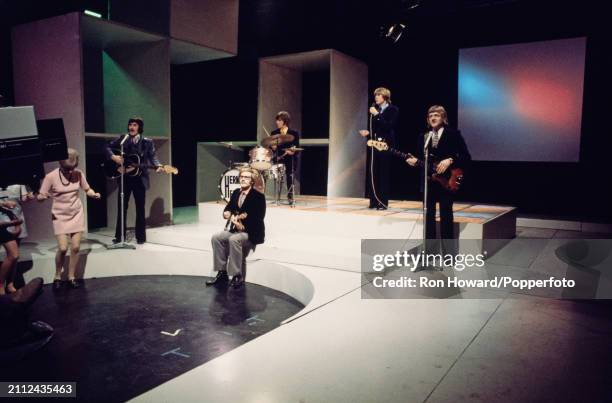 English pop group Herman's Hermits perform on the set of a pop music television show in London in 1969. Members of the band are, from left,...