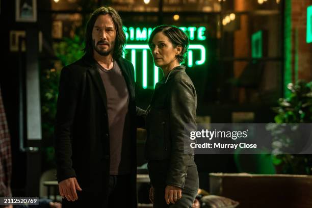 Actors Keanu Reeves and Carrie-Anne Moss on the set of "The Matrix Reserrections", Berlin, Germany, 2020. {Photo by Murray Close/Getty Images}