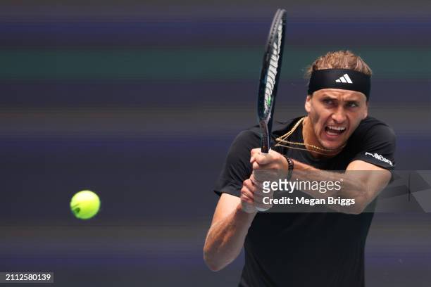 Alexander Zverev of Germany returns a shot to Chris Eubanks of the United States during his men's singles match during the Miami Open at Hard Rock...