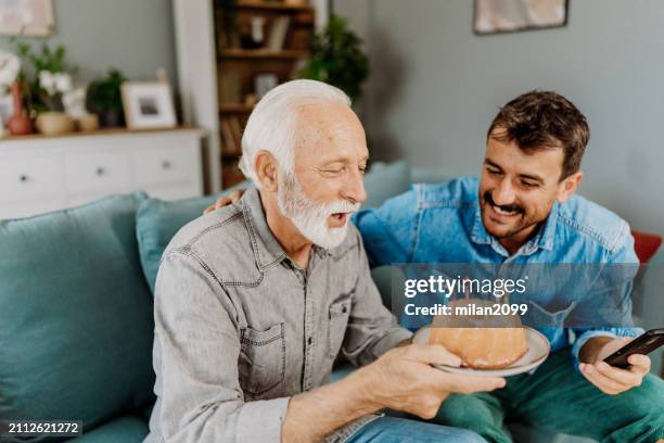 birthday celebration - senior birthday stock pictures, royalty-free photos & images