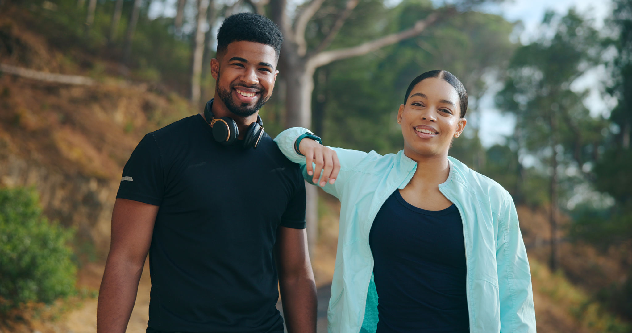 Portrait happy young couple ready to exercise outdoors. Portrait happy young couple ready to exercise outdoors.