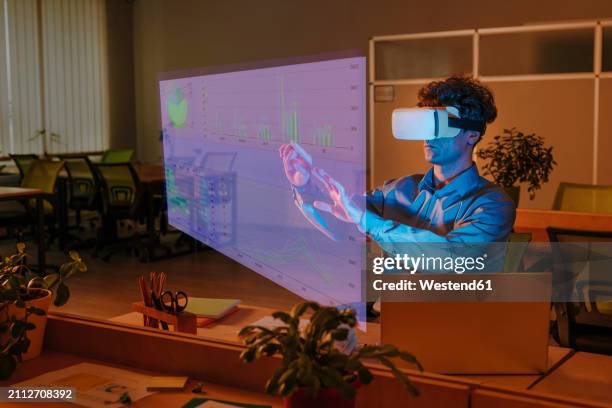 businessman interacting with graphical interface using virtual reality simulator in office - lighting technique stock illustrations