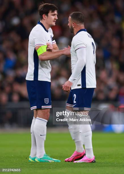 Kyle Walker passes the Captains armband to Harry Maguire of England during the international friendly match between England and Brazil at Wembley...