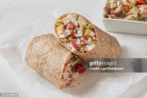 the viral chopped cold cut wrap tortilla - chopped food stock pictures, royalty-free photos & images