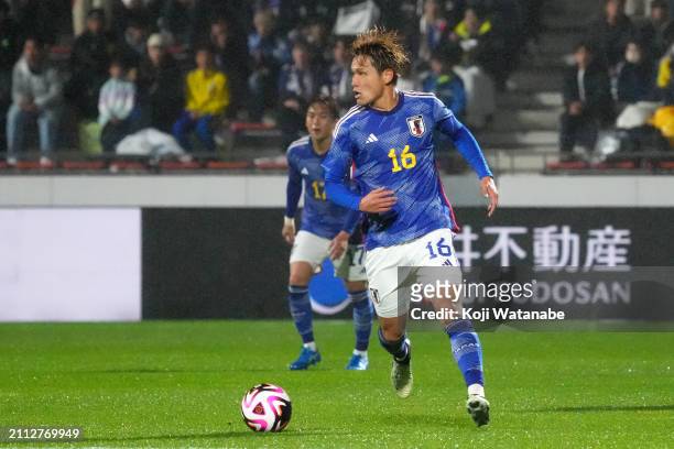 Kuryu Matsuki of Japan in action during the U-23 international friendly match between Japan and Ukraine at Mikuni World Stadium Kitakyushu on March...