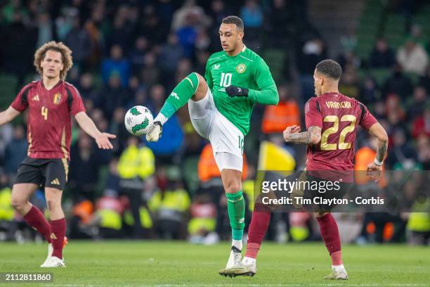 March 23: Adam Idah of Ireland defended by Aster Vranckx of Belgium during the Republic of Ireland V Belgium, International friendly match at Aviva...
