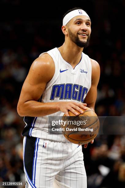 Jalen Suggs of the Orlando Magic shoots a free throw against the Minnesota Timberwolves in the fourth quarter at Target Center on February 02, 2024...