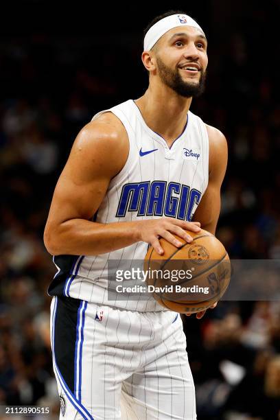 Jalen Suggs of the Orlando Magic shoots a free throw against the Minnesota Timberwolves in the fourth quarter at Target Center on February 02, 2024...