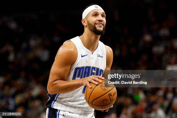 Jalen Suggs of the Orlando Magic shoots a free throw against the Minnesota Timberwolves in the fourth quarter at Target Center on February 02, 2024...