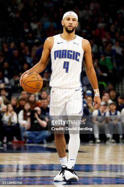 Jalen Suggs of the Orlando Magic dribbles the ball against the Minnesota Timberwolves in the fourth quarter at Target Center on February 02, 2024 in...