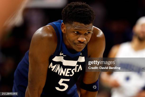 Anthony Edwards of the Minnesota Timberwolves looks on against the Orlando Magic in the fourth quarter at Target Center on February 02, 2024 in...