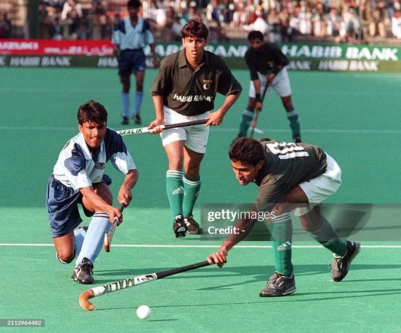 Pakistan Rajesh Shahbaz Senior of Pakistan blocks Rajesh Chohan of India in their ...