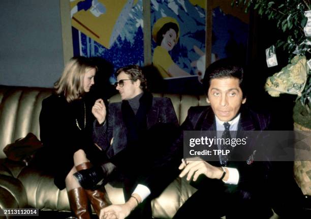 American actress Jessica Lange and Latvian and American dancer Mikhail Baryshnikov talk as Italian fashion designer Valentino Garavani holds his...