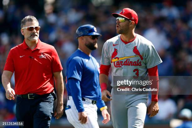 Dylan Carlson of the St. Louis Cardinals leaves the field after an apparent injury during the second inning of a spring training game against the...